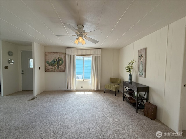 1200 Lincoln St Unit 418, Bellingham, WA 98229 - living area featuring a ceiling fan and carpet floors