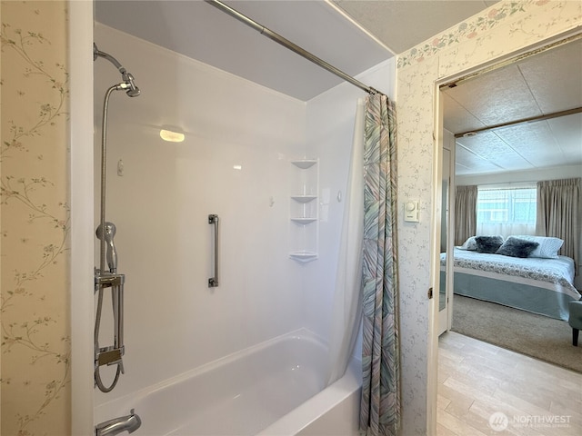 1200 Lincoln St Unit 418, Bellingham, WA 98229 - full bath featuring wallpapered walls, shower / bath combination with curtain, connected bathroom, and wood finished floors