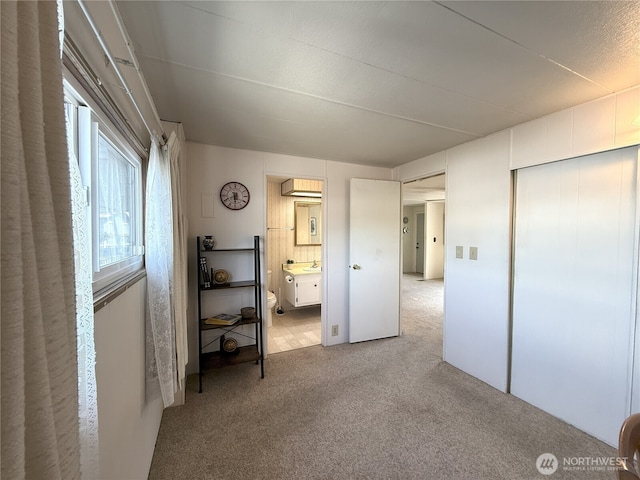 1200 Lincoln St Unit 418, Bellingham, WA 98229 - bedroom with carpet flooring, a closet, and ensuite bath