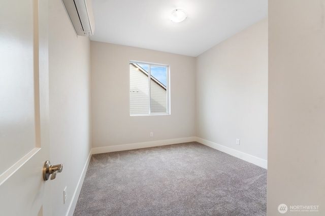 5763 S Sherri Lea Rd, Spokane, WA 99224 - spare room with a wall mounted AC and carpet