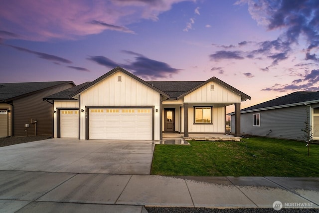 5819 S Sherri Lea Rd, Spokane, WA 99224 - modern inspired farmhouse featuring board and batten siding, a garage, a front yard, driveway, and covered porch