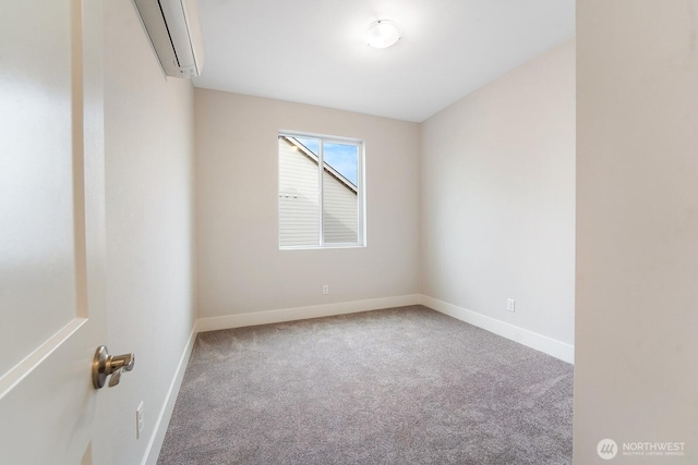 5819 S Sherri Lea Rd, Spokane, WA 99224 - carpeted spare room with a wall mounted air conditioner and baseboards