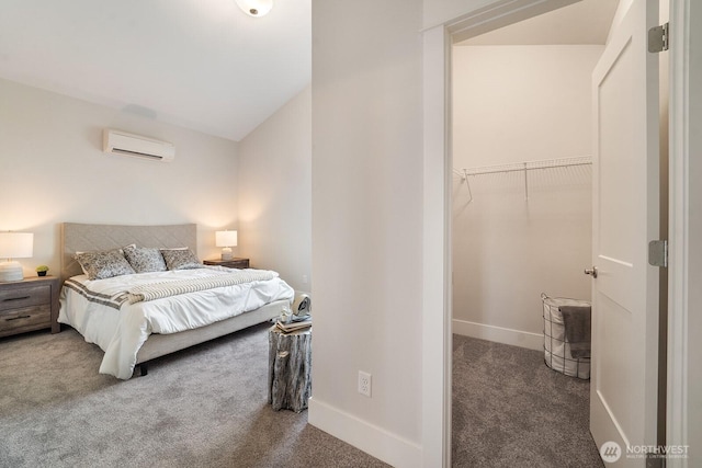 5819 S Sherri Lea Rd, Spokane, WA 99224 - carpeted bedroom with an AC wall unit, vaulted ceiling, and a spacious closet