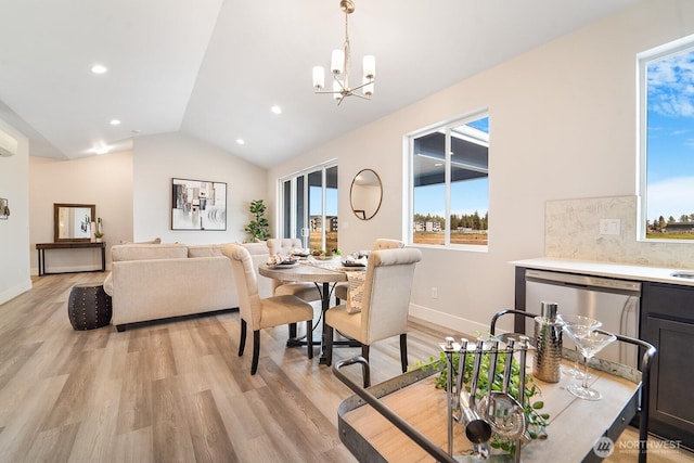 5819 S Sherri Lea Rd, Spokane, WA 99224 - dining room featuring a chandelier, vaulted ceiling, light wood-type flooring, and recessed lighting