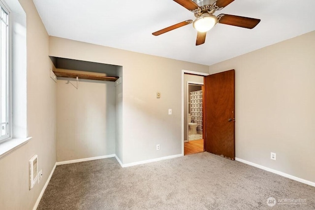 636 Nevil Rd, Winlock, WA 98596 - unfurnished bedroom with carpet floors, a closet, and a ceiling fan