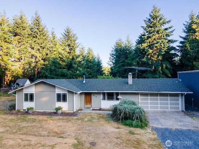 636 Nevil Rd, Winlock, WA 98596 - ranch-style house featuring a garage, driveway, a chimney, and roof with shingles