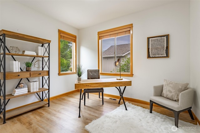 9002 Gleneagle Dr, Blaine, WA 98230 - home office with wood finished floors and baseboards