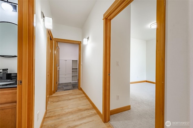 9002 Gleneagle Dr, Blaine, WA 98230 - corridor featuring baseboards and light wood finished floors