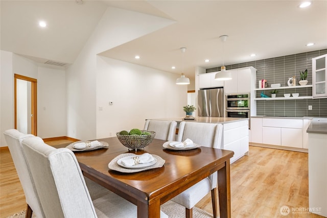 9002 Gleneagle Dr, Blaine, WA 98230 - dining room featuring light wood-style floors and recessed lighting