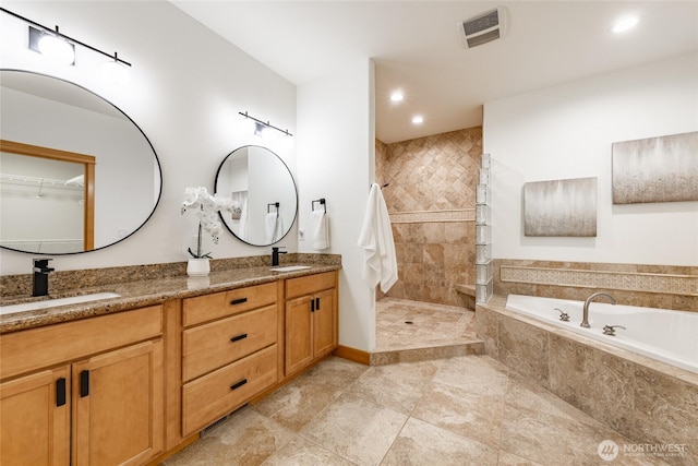 9002 Gleneagle Dr, Blaine, WA 98230 - bathroom with a garden tub, double vanity, a walk in shower, and recessed lighting