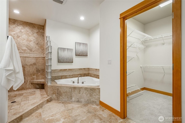 9002 Gleneagle Dr, Blaine, WA 98230 - full bathroom featuring a bath, tiled shower, recessed lighting, and a spacious closet