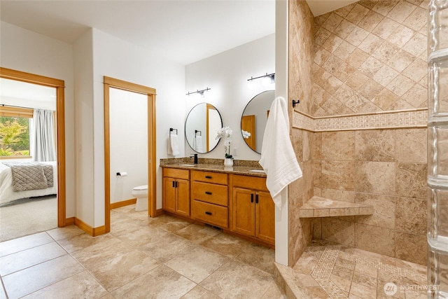 9002 Gleneagle Dr, Blaine, WA 98230 - ensuite bathroom featuring double vanity, a tile shower, and tile patterned flooring