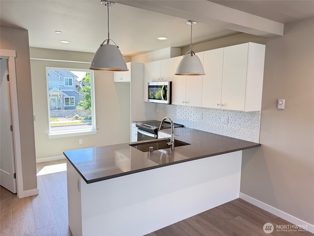 664 LOT25 W Kline Rd, Bellingham, WA 98226 - kitchen featuring stainless steel appliances, tasteful backsplash, wood finished floors, dark countertops, and recessed lighting