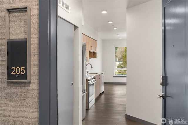 11903 NE 128th St Unit 205, Kirkland, WA 98034 - corridor featuring dark wood-type flooring and recessed lighting