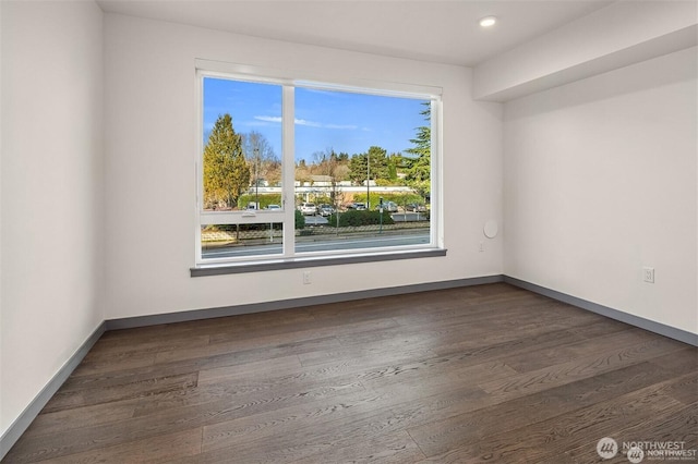 11903 NE 128th St Unit 205, Kirkland, WA 98034 - unfurnished room with dark wood finished floors and recessed lighting