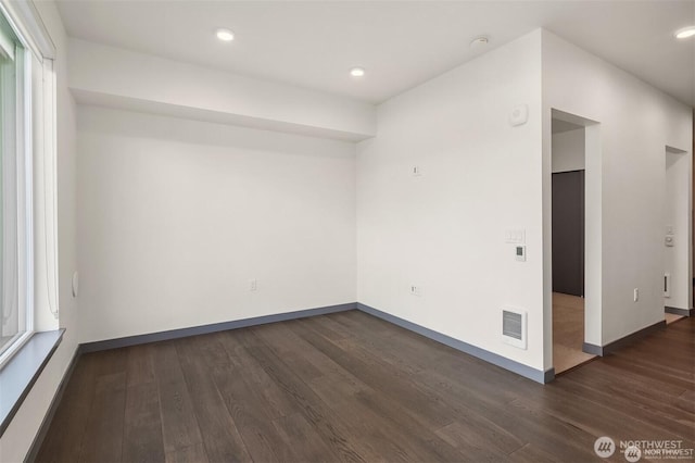 11903 NE 128th St Unit 205, Kirkland, WA 98034 - empty room featuring dark wood-style floors, a smoke detector, and recessed lighting