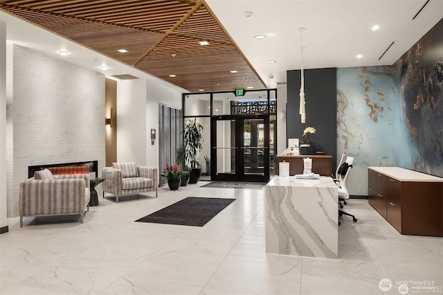 11903 NE 128th St Unit 205, Kirkland, WA 98034 - community lobby featuring recessed lighting and a wall of windows
