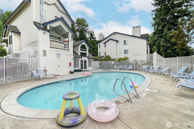 5000 Lake Washington Blvd NE Unit B201, Renton, WA 98056 - community pool featuring a patio area