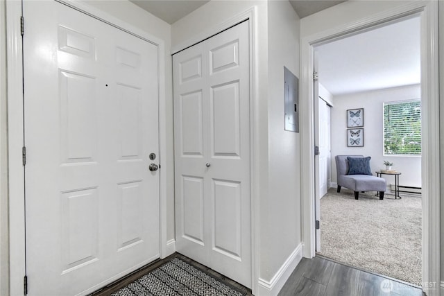 5000 Lake Washington Blvd NE Unit B201, Renton, WA 98056 - foyer entrance featuring a baseboard radiator and dark wood-style floors