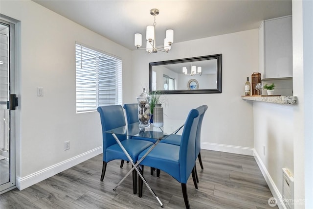 5000 Lake Washington Blvd NE Unit B201, Renton, WA 98056 - dining space with a chandelier and wood finished floors