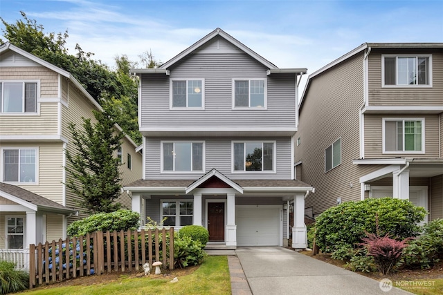 21270 40th Way S Unit 35, Seatac, WA 98198 - view of front of house with a garage and concrete driveway