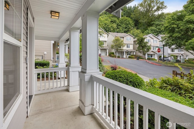 21270 40th Way S Unit 35, Seatac, WA 98198 - covered porch with a residential view