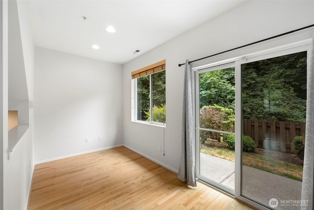 21270 40th Way S Unit 35, Seatac, WA 98198 - doorway to outside with light wood-style flooring and recessed lighting