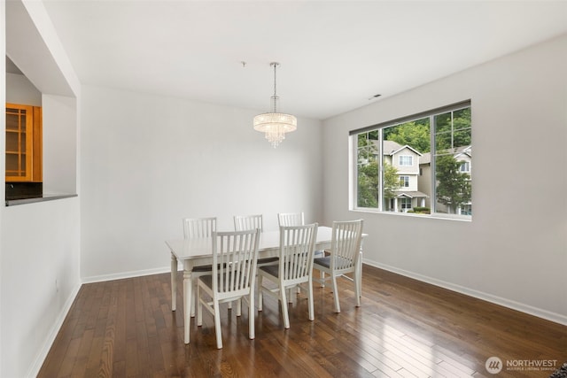 21270 40th Way S Unit 35, Seatac, WA 98198 - dining room with a chandelier and hardwood / wood-style floors