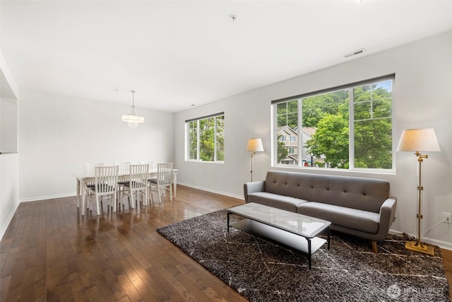 21270 40th Way S Unit 35, Seatac, WA 98198 - living room featuring wood-type flooring and a chandelier