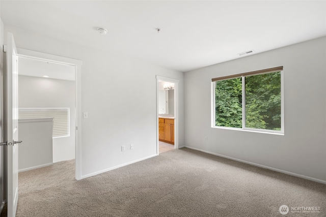 21270 40th Way S Unit 35, Seatac, WA 98198 - unfurnished bedroom with light carpet and ensuite bathroom