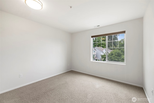 21270 40th Way S Unit 35, Seatac, WA 98198 - carpeted spare room featuring baseboards