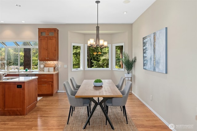 1805 179th Pl NE, Bellevue, WA 98008 - dining area with light wood finished floors, a chandelier, and recessed lighting