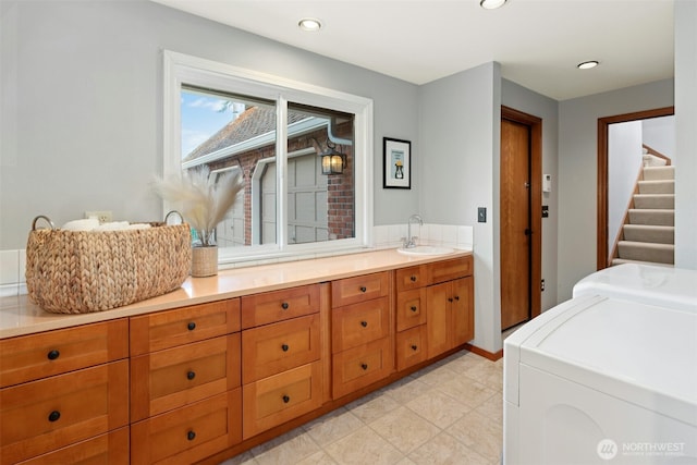 1805 179th Pl NE, Bellevue, WA 98008 - laundry room with washing machine and clothes dryer and recessed lighting