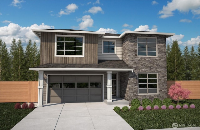 20851 156th St E, Bonney Lake, WA 98391 - view of front of home featuring driveway, stone siding, and an attached garage