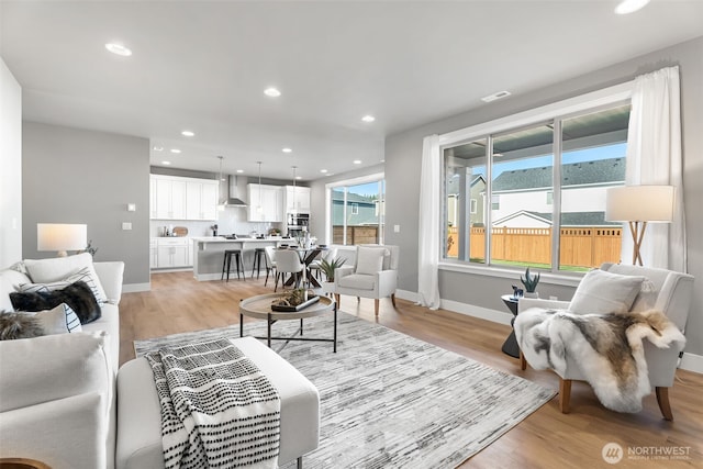 20851 156th St E, Bonney Lake, WA 98391 - living area with light wood-style floors and recessed lighting