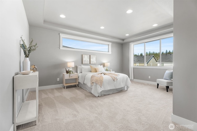 20851 156th St E, Bonney Lake, WA 98391 - bedroom featuring multiple windows, light carpet, recessed lighting, and a raised ceiling