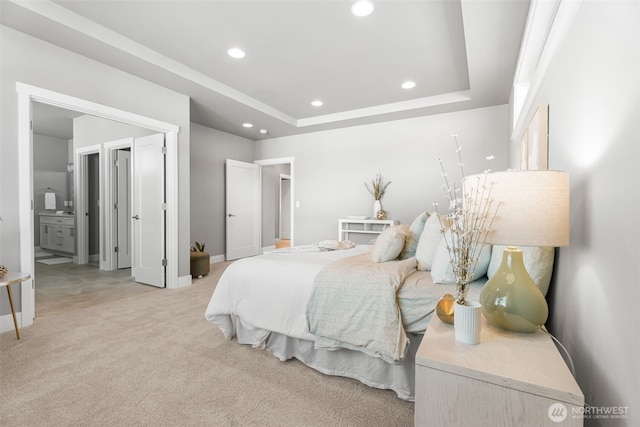 20851 156th St E, Bonney Lake, WA 98391 - bedroom with light colored carpet, recessed lighting, a tray ceiling, and ensuite bath