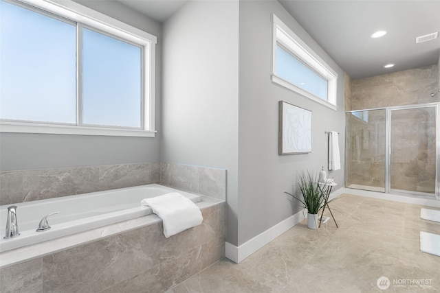 20851 156th St E, Bonney Lake, WA 98391 - full bathroom featuring a bath, a shower stall, recessed lighting, and tile patterned flooring