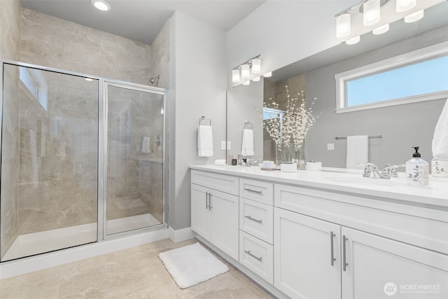 20851 156th St E, Bonney Lake, WA 98391 - bathroom with double vanity, a shower stall, recessed lighting, and tile patterned floors