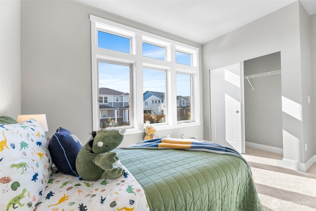20851 156th St E, Bonney Lake, WA 98391 - carpeted bedroom featuring a closet and baseboards