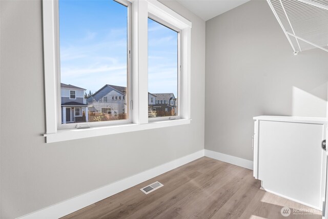 20851 156th St E, Bonney Lake, WA 98391 - additional living space featuring baseboards and wood finished floors
