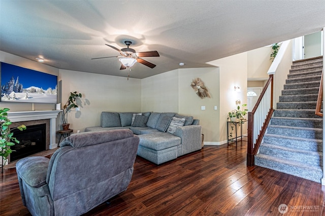 5003 Madison Heights Ct SE, Olympia, WA 98501 - living room featuring stairway, a ceiling fan, wood finished floors, and a fireplace