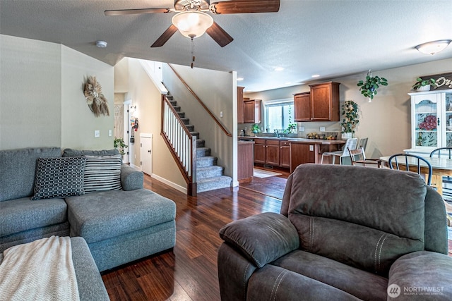 5003 Madison Heights Ct SE, Olympia, WA 98501 - living room with ceiling fan, a textured ceiling, dark wood-style floors, and stairway