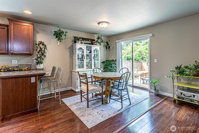 5003 Madison Heights Ct SE, Olympia, WA 98501 - dining area featuring dark wood finished floors, a textured ceiling, and recessed lighting