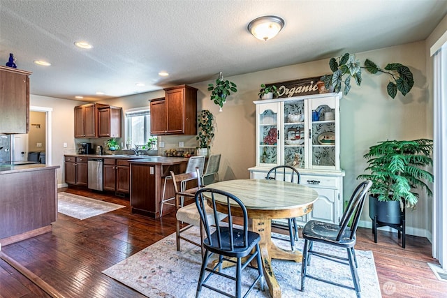 5003 Madison Heights Ct SE, Olympia, WA 98501 - dining space with dark wood-type flooring, a textured ceiling, and recessed lighting