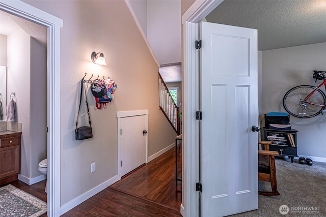 5003 Madison Heights Ct SE, Olympia, WA 98501 - hall featuring stairs and dark wood-style floors