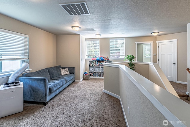 5003 Madison Heights Ct SE, Olympia, WA 98501 - living room with carpet and a textured ceiling