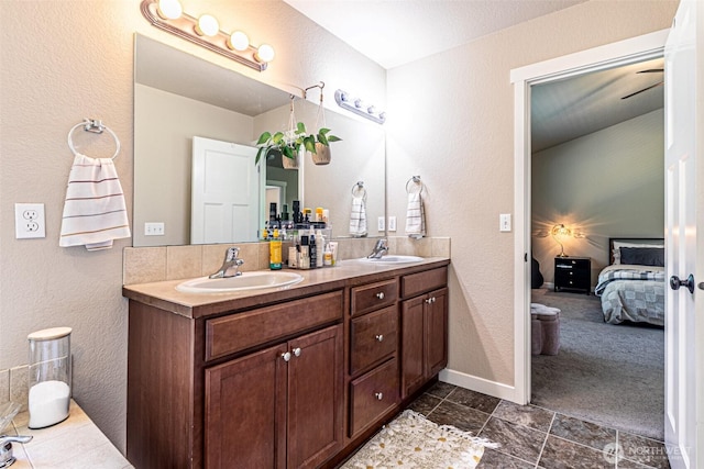 5003 Madison Heights Ct SE, Olympia, WA 98501 - full bath with double vanity, a textured wall, and ensuite bath