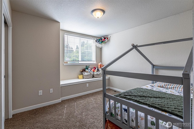5003 Madison Heights Ct SE, Olympia, WA 98501 - carpeted bedroom featuring a textured ceiling and baseboards