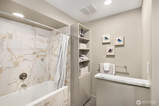 1234 Taylor Ave N Unit 401, Seattle, WA 98109 - bathroom with shower / bath combo with shower curtain and recessed lighting